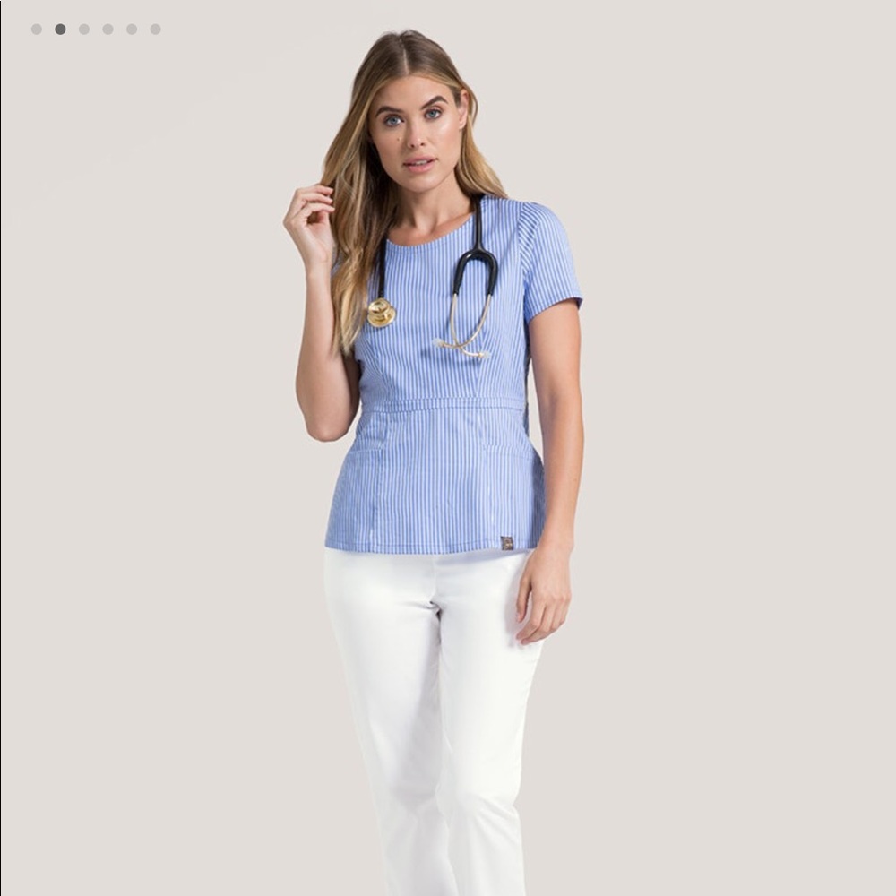 Jaanuu peplum scrub top size small brand new!